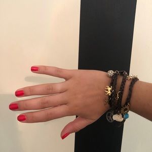 Cord wrap bracelet with multiple charms